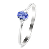 Tanzanita 0.50ct Diamante 0.06ct Anillo de tres piedras Oro blanco 9k