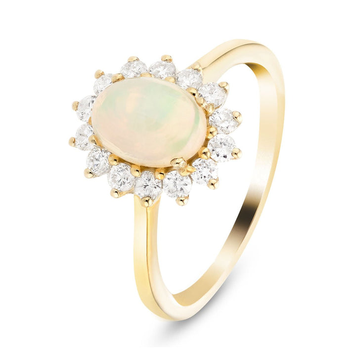 Anillo de ópalo de 0,76 quilates y diamante de 0,42 quilates en oro amarillo de 9 quilates