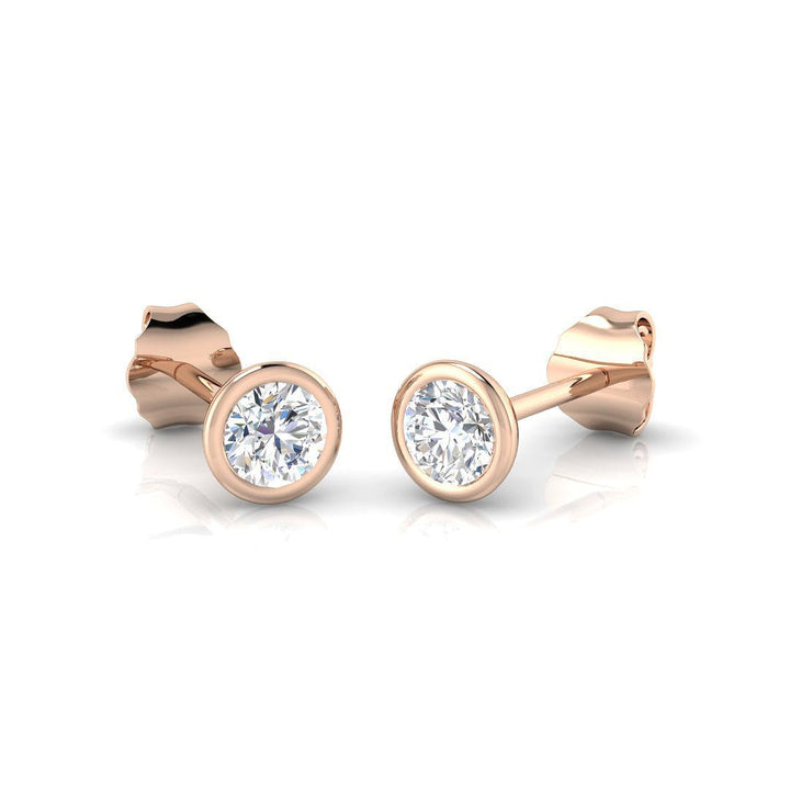 Aretes de rubí con diamantes de 0,30 ct calidad G/SI en oro rosado de 18 k