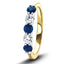 Anillo de cinco piedras con diamantes de 0,30 quilates y zafiro azul de 0,55 quilates en oro amarillo de 18 quilates