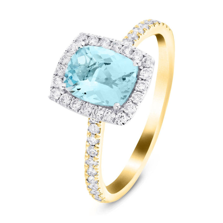 Anillo de aguamarina con halo cojín de 1,21 quilates y diamantes de 0,32 quilates en oro amarillo de 18 quilates