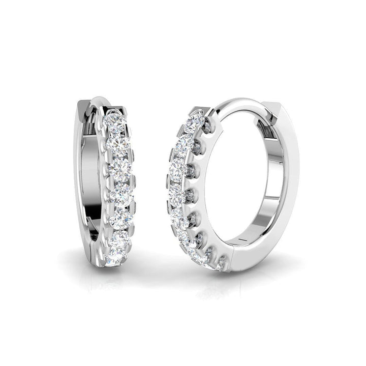 Aretes Huggie de Diamantes 0.08ct Calidad G/SI en Oro Blanco 9k