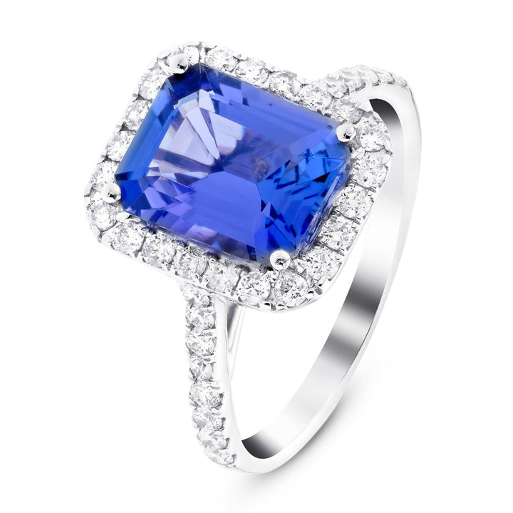 Anillo con halo de tanzanita de 4,86 ​​ct y diamante de 0,53 ct en platino