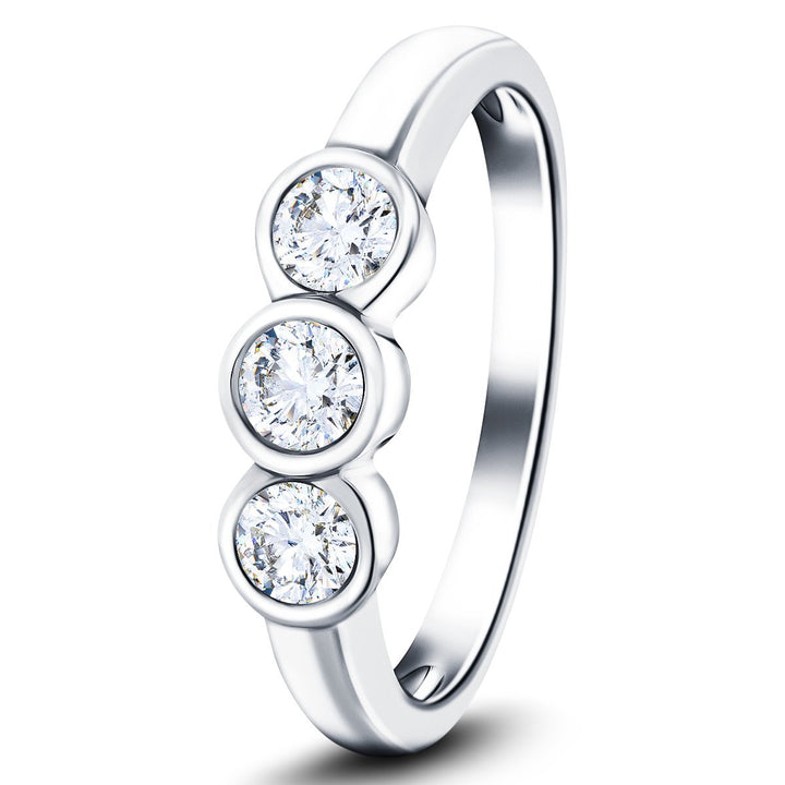 Anillo de platino con diamantes G/SI de 0,25 quilates y tres piedras en engaste de bisel